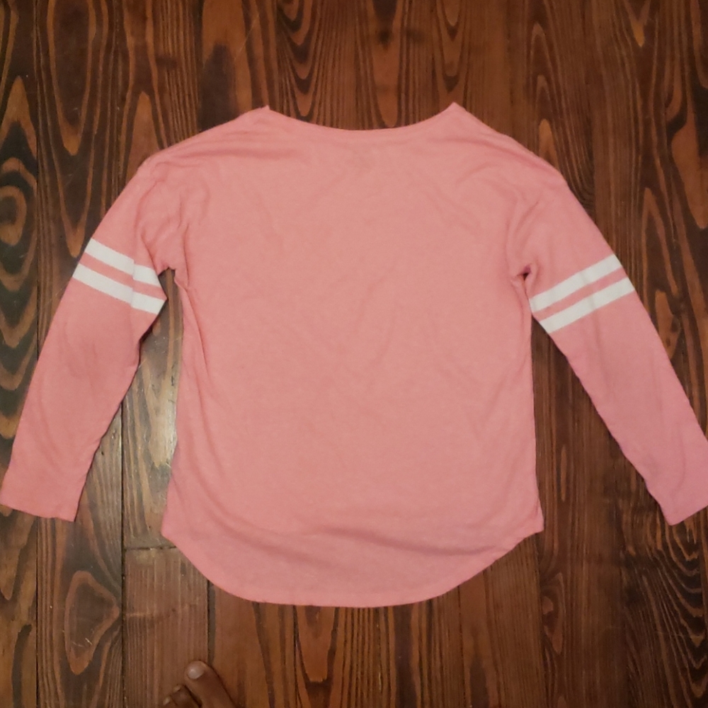 Pink long-sleeve shirt with white stripes